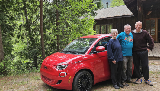 Small red car at motel